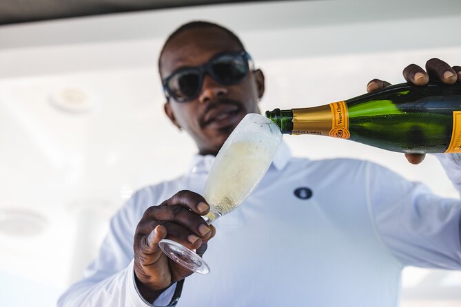 Deluxe Sunset and Saxophone Sail on Luxury Lady Grace Catamaran - Setting Out From The Ritz-Carlton Beach