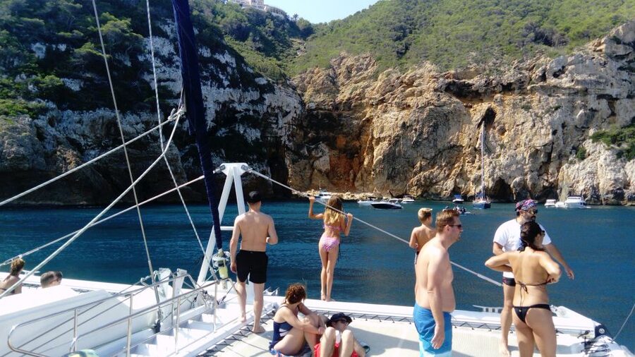 Dénia & Jávea: Portixol Sailing Catamaran Excursion with BBQ - Lunch on deck: barbecue, salad, and one drink
