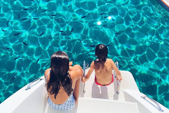 Discover Cala Bassa and Cala Comte on board a catamaran - Beach clubs, then the famous Sant Antoni sunset