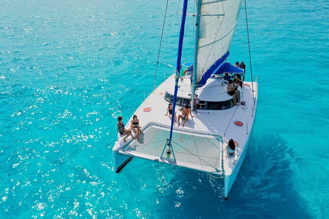 Discover Isla Mujeres: Catamaran, Snorkeling, and "Ice Bar" - Pickup zones and the cost of getting there