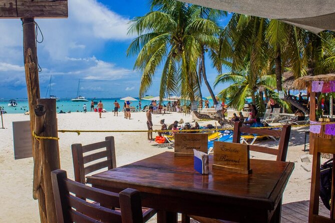 Discover Isla Mujeres: Catamaran, Snorkeling, and "Ice Bar" - Buffet lunch at the beach club