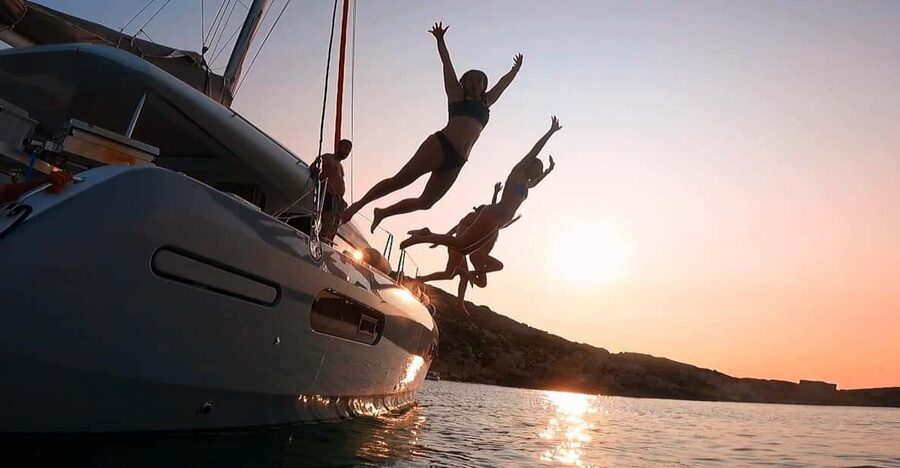 Evening Catamaran Charter - Swimming, snorkeling, and paddleboarding