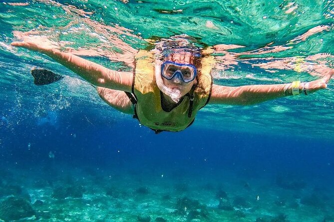 Exciting Catamaran Tour to Isla Mujeres, from Cancún! - Boarding the catamaran and settling into the ride