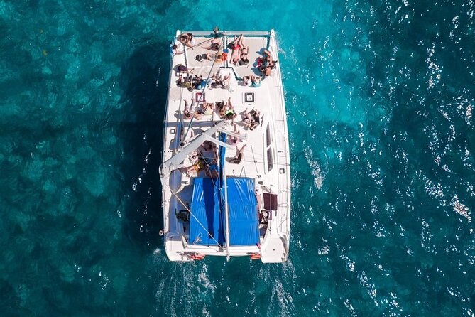 Exciting Catamaran Tour to Isla Mujeres, from Cancún! - Beach-club lunch and the practical details