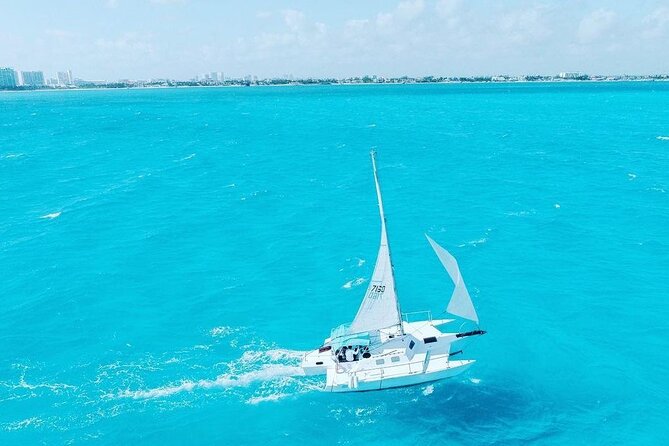Exciting Catamaran Tour to Isla Mujeres, from Cancún! - The crew, music, and social atmosphere