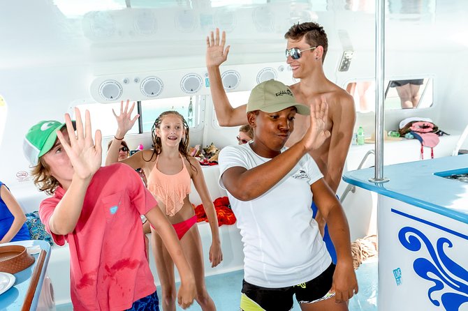 Family Catamaran & Snorkeling Cruise Turks & Caicos - Open bar, snacks, and a live DJ onboard