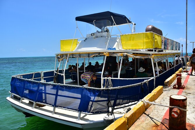 Fantastic Day Isla Mujeres Unlimited Catamaran from Riviera Maya - Sailing toward Punta Sur and the beach club