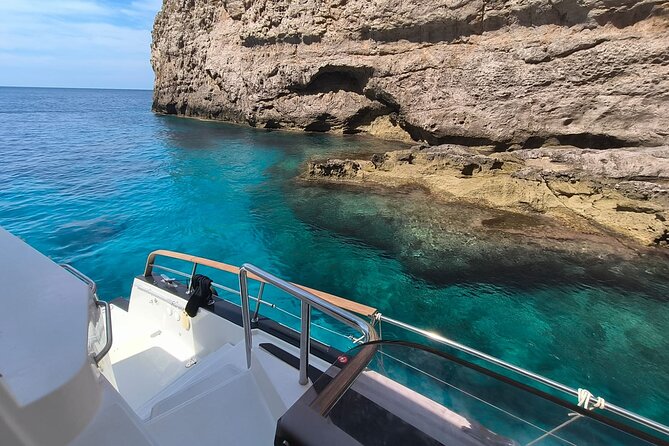 Favignana Egadi Islands Luxury Catamaran Tour with Lunch - Cala del Pozzo, lunch, and a quiet swim near Favignana
