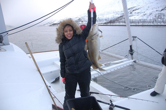 Fishing Trip with Luxury Catamaran in Tromso - The saloon, suits, and the cold-weather question