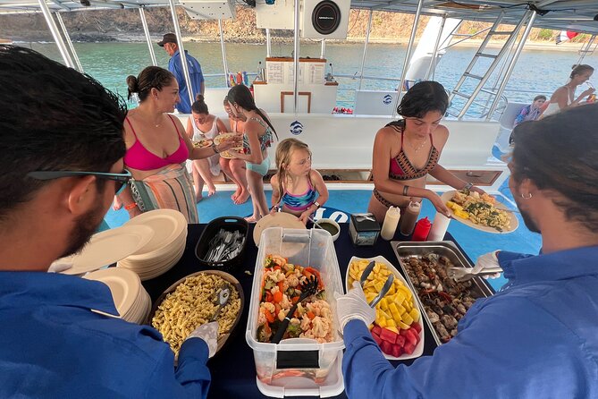 Flamingo Family Fun Catamaran Snorkel:Comfortable shaded seating - Waterslide, jumping platform, and family appeal