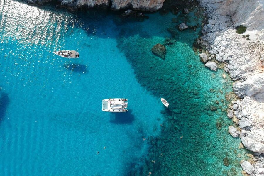 From Adamas: Milos and Poliegos Catamaran Cruise with Lunch - Gerontas, Fyriplaka, and Tsigrado from the water