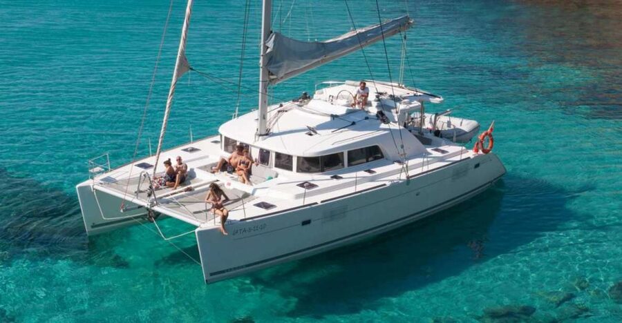 From Adamas: Milos and Poliegos Catamaran Cruise with Lunch - Gerakas and lunch surrounded by rock