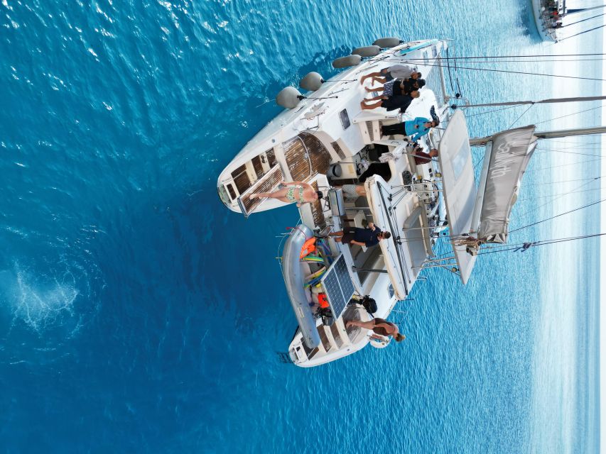 From Adamas: Milos and Poliegos Catamaran Cruise with Lunch - Leaving Adamas and heading toward Cape Vani