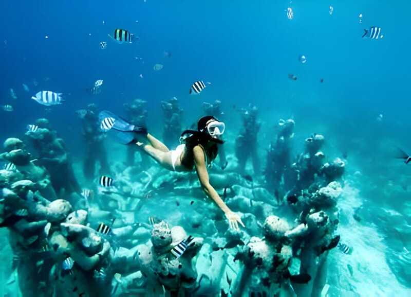 From Cancun: Isla Mujeres by Luxury Catamaran with Drinks - Playa Norte gives you the best island pause