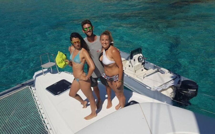 From Cannigione: Catamaran tour among La Maddalena islands - Swimming, snorkeling, and beach time