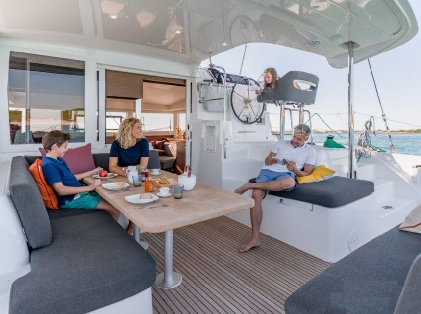 From Cannigione: Catamaran tour in La Maddalena Archipelago - The onboard lunch is a major part of the value