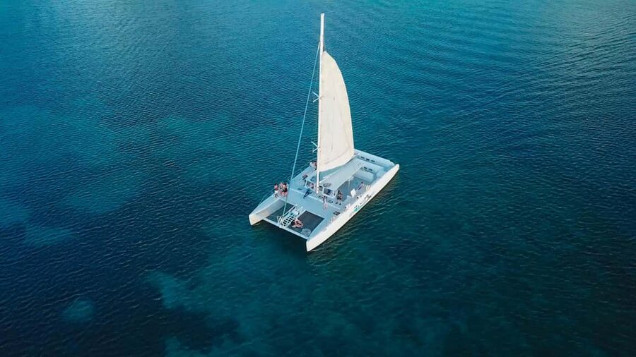 From Castries: Full-Day Catamaran Tour to Soufriere - From Hotel Pickup to the West Coast