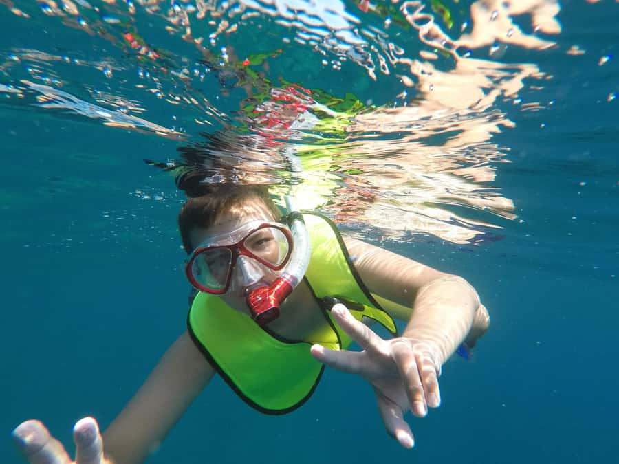 From Cozumel: El Cielo Beach by Catamaran Snorkeling Tour - The catamaran turns lunch into part of the outing