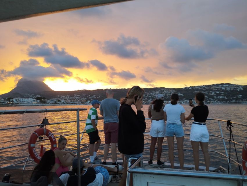 From Denia: Sunset Catamaran Trip - Returning to port after darkening skies
