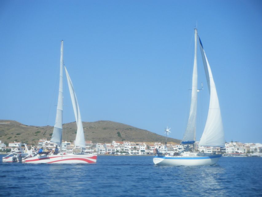 From Fornells: Half-Day Menorca Catamaran Trip w/ Snorkeling - Snorkeling in calm Mediterranean water