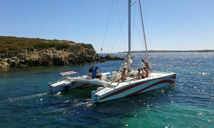 From Fornells: Half-Day Menorca Catamaran Trip w/ Snorkeling - Drinks, snacks, and the value of $88