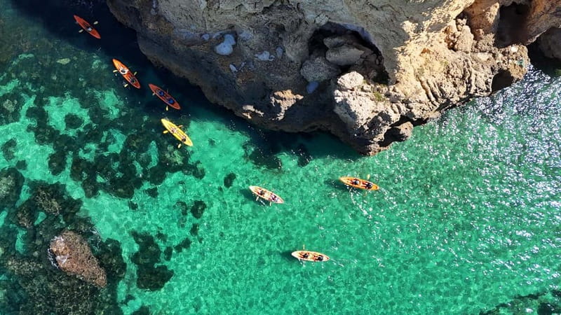 From Lagos: Ponta da Piedade Caves Kayak Tour from Catamaran - Inside the caves and arches of Ponta da Piedade