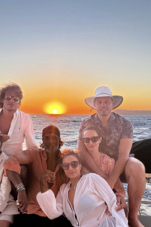 From Ornos: Mykonos Delos Catamaran Cruise with Meal & SUP - Leaving Ornos on a small catamaran