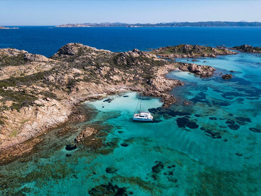 From Palau: La Maddalena Archipelago Catamaran Tour w/ Lunch - Stop one: finding the right cove for the weather