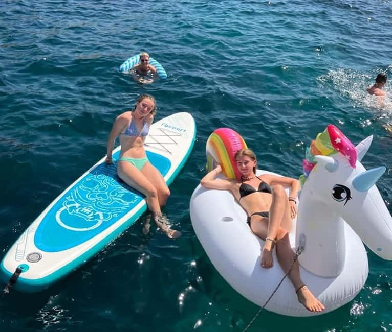 From Palma: Luxury Catamaran Group Tour with Tapas & Drinks - Tapas, cava, and the real food value