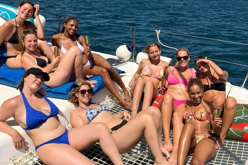 From Palma: Luxury Catamaran Group Tour with Tapas & Drinks - Crew service and practical comfort