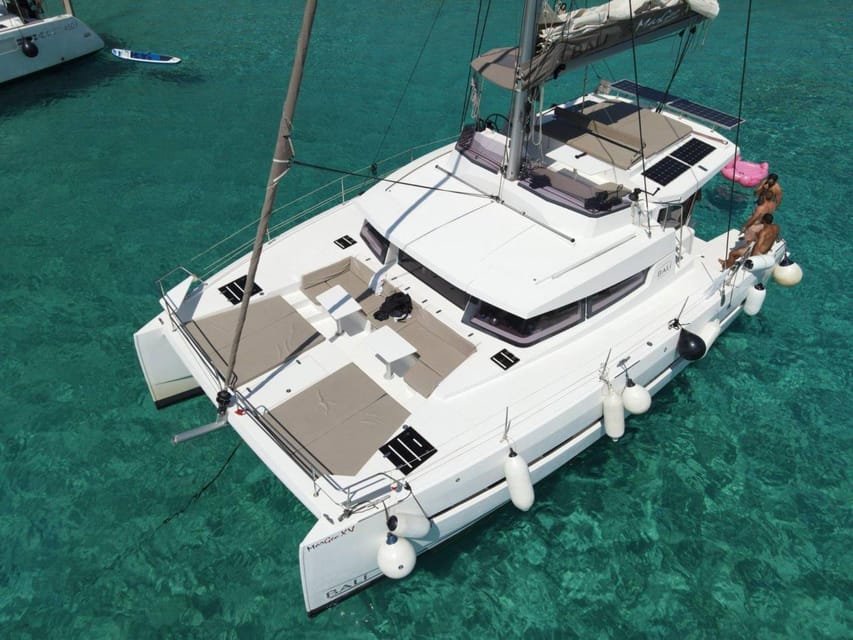 From Panormo: Private Sailing Catamaran Cruise with Lunch - Three hours in Bali Village Bay