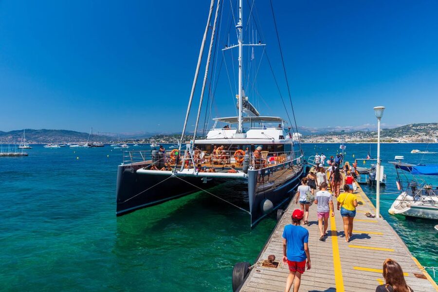 Full-Day Catamaran Cruise Departing from Cannes - Sailing toward the Massif de lEsterel