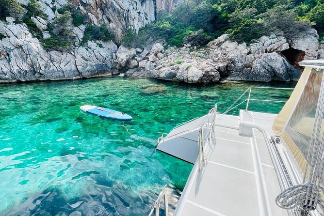 Full day Catamaran cruise in Porto Conte Natural Park - Food, wine, and the human side of the trip