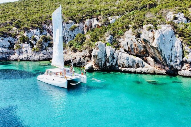 Full day Catamaran cruise in Porto Conte Natural Park - Swimming, snorkeling, and paddle boarding