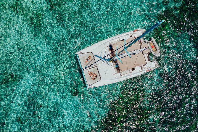 Full Day Catamaran Cruise - North Ilot Gabriel (sharing) - Lunch, drinks, and the practical comforts onboard