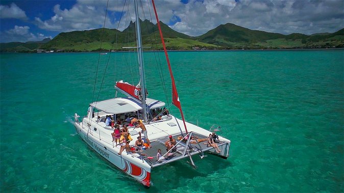 Full-Day Catamaran Cruise to Île aux Cerfs with BBQ Lunch - The Return Ride With Sega Music