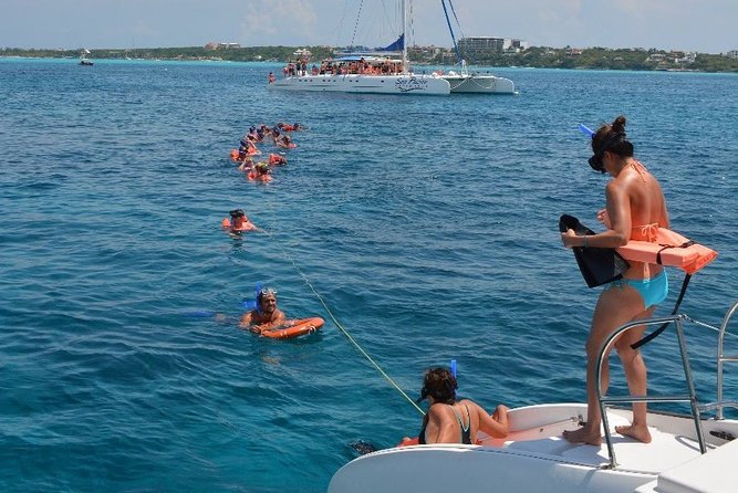 Full-Day Catamaran Tour to Isla Mujeres from Cancun with Lunch - From Marina Las Perlas to the open Caribbean
