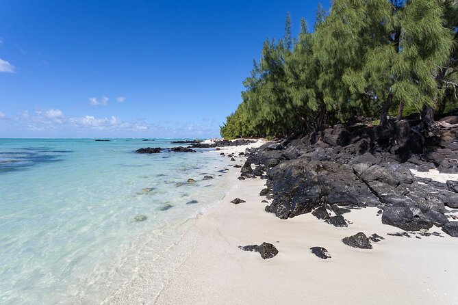 Full Day Shared Tour Catamaran to Ile Aux Cerfs - Sailing across the lagoon toward Ile aux Cerfs