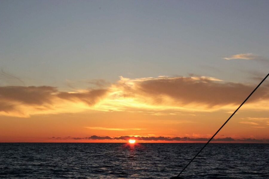 Funchal: Cabo Girão Sunset Catamaran Tour - Returning with the sun behind the island