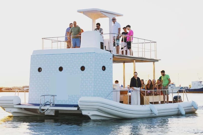 Giardini Naxos: Dolphin Catamaran Sunset Tour with Aperetif - Isola Bella, the Blue Grotto, and the Coast of Myths