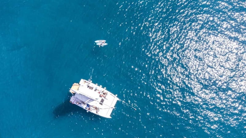 Gran Canaria: Catamaran Tour with Lunch on Pristine Beaches - A Second Stop for Caves, Swimming, and Paddleboards