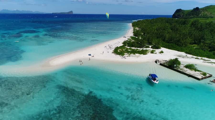 Grand Baie: Catamaran 3 Islands Cruise & Lunch on the Island - Leaving Grand Baie by catamaran