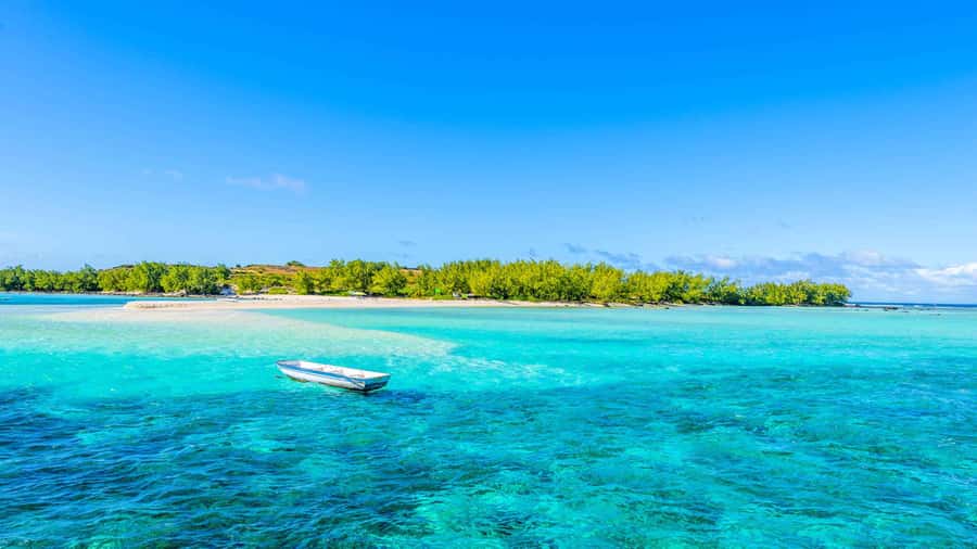 Grand Bay: Catamaran Cruise to Flat Island with BBQ Lunch - From Grand Baie beach to the open water