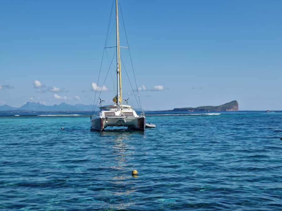 Grand Bay: Catamaran Cruise to Flat Island with BBQ Lunch - Sailing toward Île Plate and the northern islands