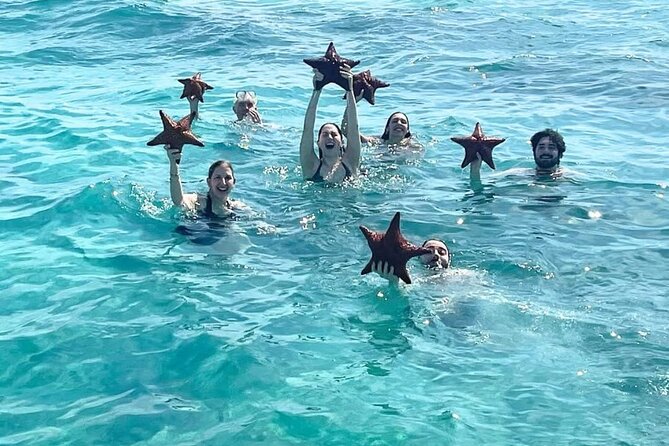 Group Catamaran 4 hr tour coral reef fun Iguana island adventure! - Reef snorkeling comes first
