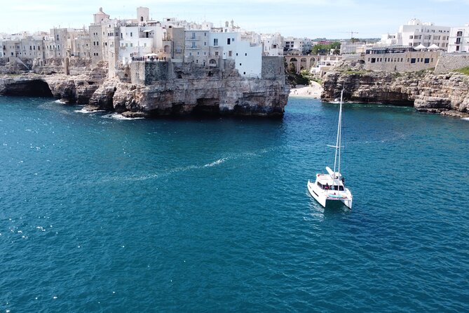 Guided Tour by Catamaran with Aperitif from Polignano a Mare - Morning light or a late-afternoon departure
