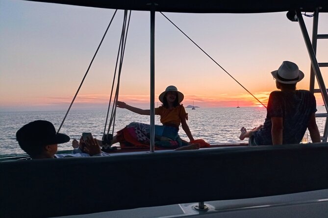 Half-Day Exclusive Catamaran Cruise in Santorini with Meal and Open Bar - Venetian Lighthouse and the Caldera View