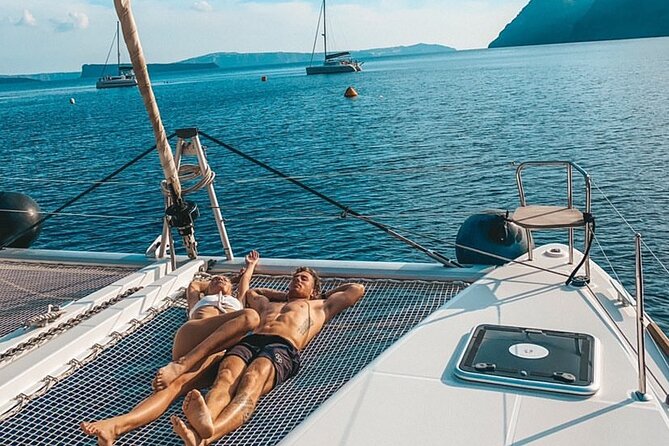Half Day Premium Catamaran Cruise in Santorini including Oia - Food, drinks, and crew service