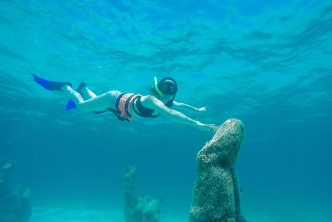 Half Day Sailing Private Catamaran to Isla Mujeres - Drinks, music, and the social side of the boat