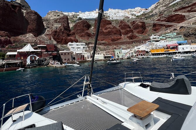 Half-Day Tailor-made Private Catamaran Cruise in Santorini - Limestone formations and clear-water swimming